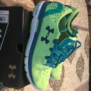 UA W speedform sling shot tennis shoes.